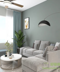 客廳牆身用上兩種深淺不一的灰綠色油漆，灰色布藝梳化旁邊配上大盆的綠色植物和湖水綠窗簾，迎著柔和的光線和微風，坐在客廳一整天都不會膩。