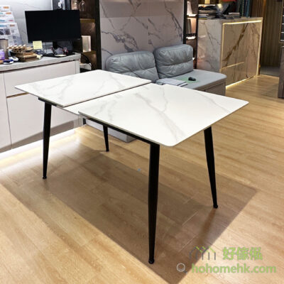 The operation of the expandable dining table is very simple. By pulling open one side of the tabletop, you will see the extension leaf stored underneath the table. Instantly, the dining table extends.
