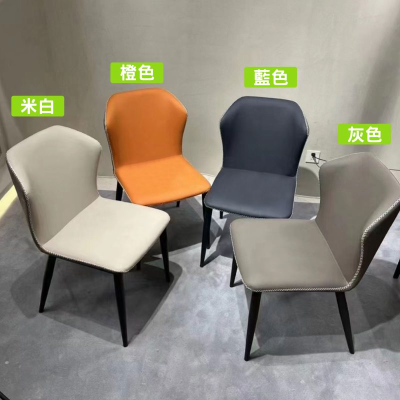 #602蝴蝶式Choco仿皮餐椅四色版本同場展示，左起米白、橙色、藍色、灰色四張並排，每張椅均採用蝴蝶形靠背設計，黑色金屬椅腳，展示廳背景下四種顏色清晰可見