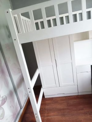 Physical photo: white bed under the wardrobe