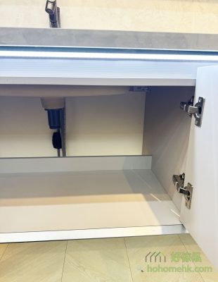 There is no backboard under the basin cabinet to facilitate installation and maintenance of the pipe, and a low baffle is made in the storage position to prevent things from falling down from the back.